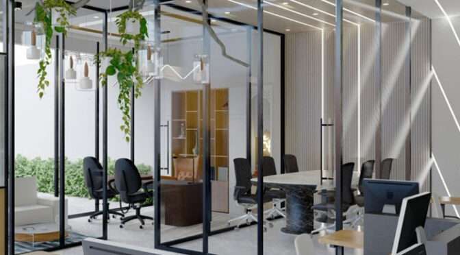 Modern London office space by Oraanj Interior Design with glass partitions, creative lighting, and sleek workstations.