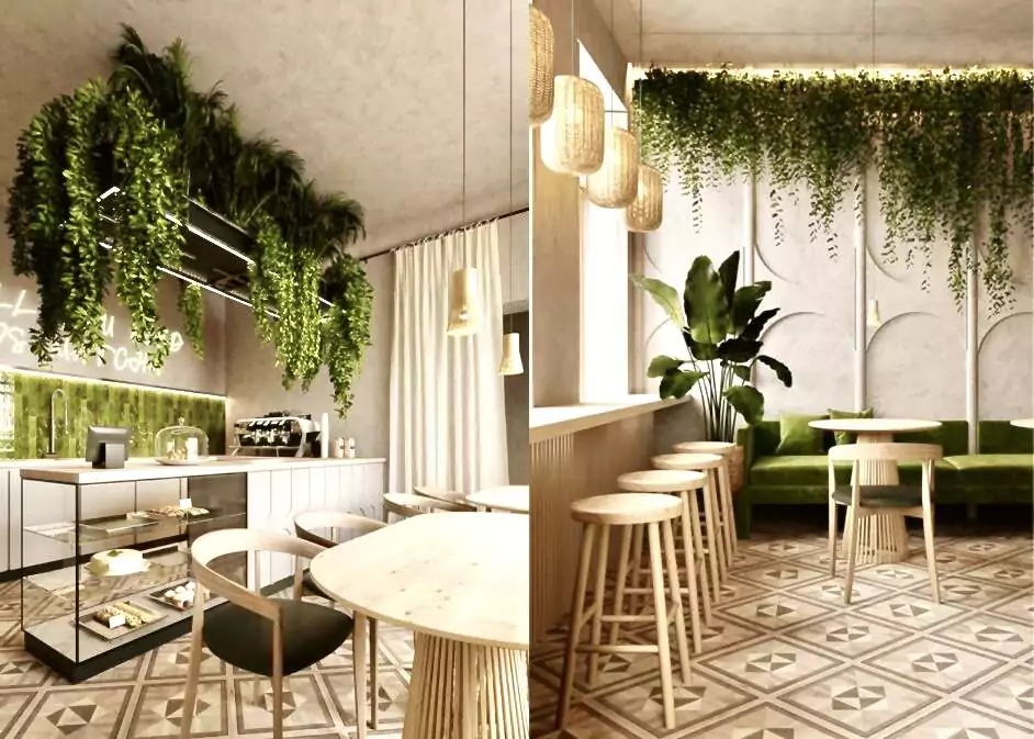 A stylish cafe interior by Oraanj Interior Design in London, featuring lush greenery hanging from the ceiling, natural wood furniture, green velvet seating, and patterned tiled flooring.