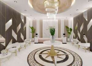 Elegant hotel lobby design in London by Oraanj Interior Design featuring a grand chandelier, marble flooring, and plush seating. Elegant hotel lobby design in London by Oraanj Interior Design featuring a grand chandelier, marble flooring, and plush seating.