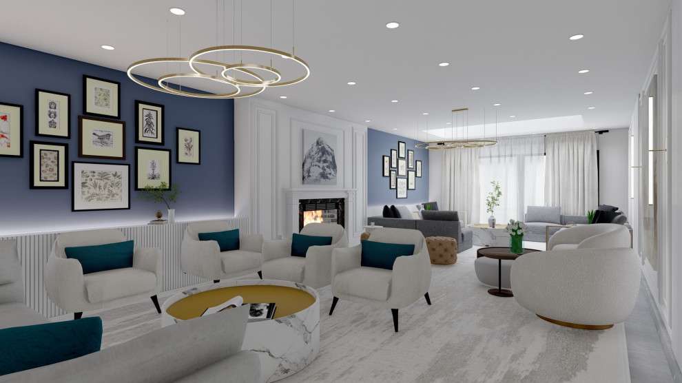 Modern office pantry and breakout area with blue kitchen cabinets, round white tables, grey sofas, and industrial pendant lighting by Oraanj Interiors London.