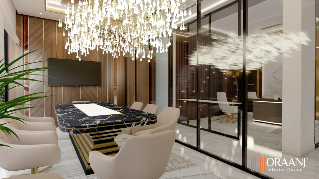 Luxury office meeting room in London featuring a black marble conference table, crystal chandelier, glass partitions, and elegant décor by Oraanj Interior Design.