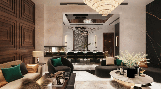 Luxurious living‑dining space with dark wood panel wall, beige and black sofas, green pillows, round marble coffee table with white flowers, large crystal chandelier, and an open view to a modern dining area with black chairs and geometric artwork.