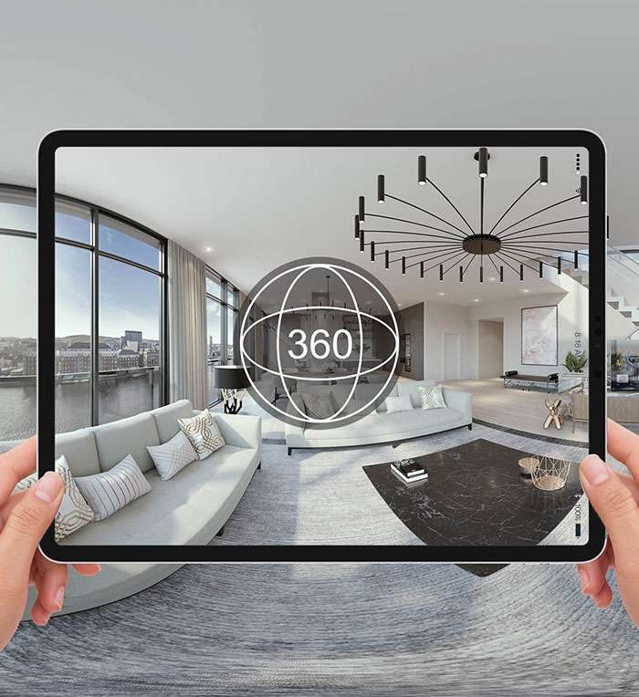 Tablet displaying 360-degree virtual tour of modern living room apartment Tablet displaying 360-degree virtual tour of modern living room apartment
