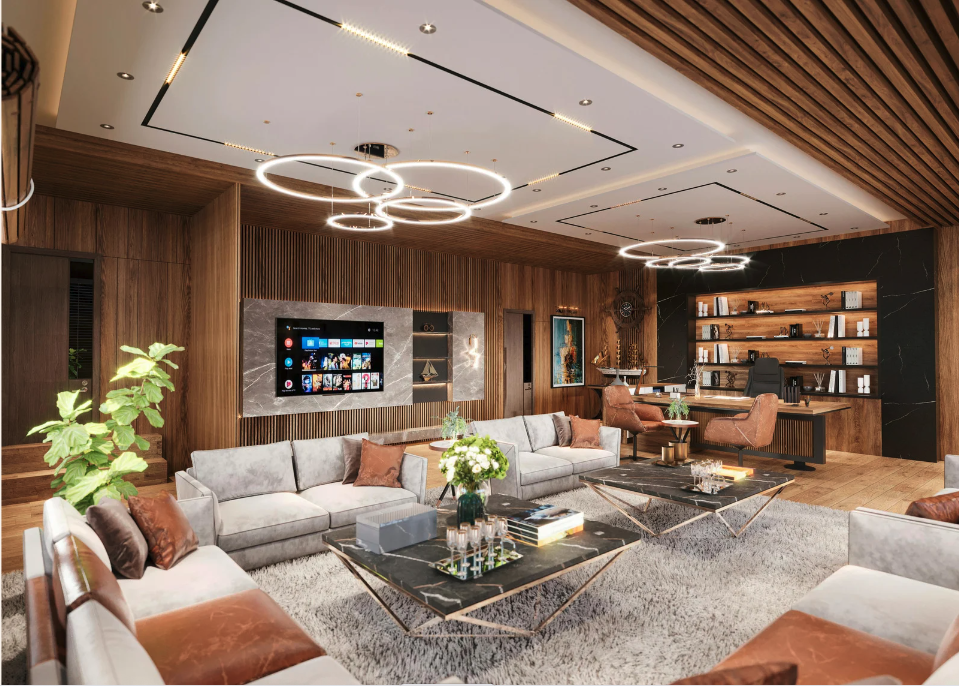 Modern luxury living room with warm wood panel walls, recessed ceiling lighting, and circular LED chandeliers over a grey sectional sofa, brown accent pillows, glass coffee tables on a shag rug, and an integrated TV entertainment unit with shelving.