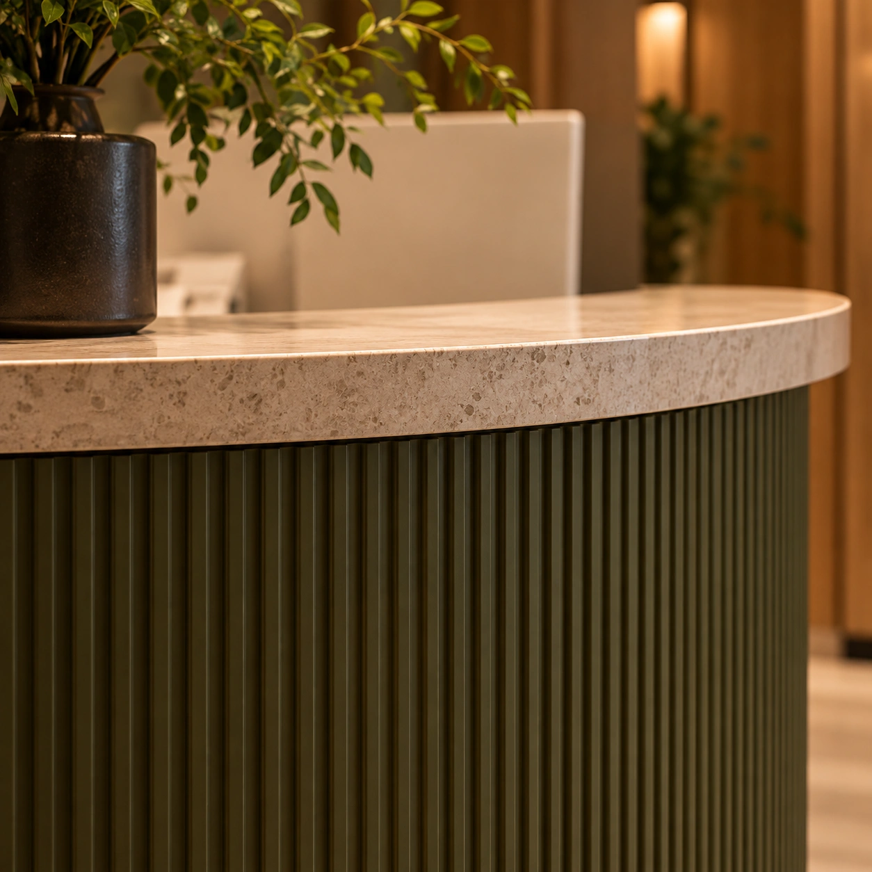 Fluted olive timber reception desk with stone counter detail, Croydon